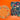 Elegant holiday-themed chocolate gift boxes and tins with colorful patterns are displayed on an orange background, accompanied by assorted wrapped chocolates in festive colors.