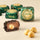 Wrapped Chocoviar Gianduia chocolates, one halved revealing a prized Piedmont IGP hazelnut, beside three whole hazelnuts. - AI generated text