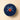 A navy blue Vintage Dream medium tin filled with assorted chocolates, finished with a light blue ribbon and red Venchi seal. - AI generated text